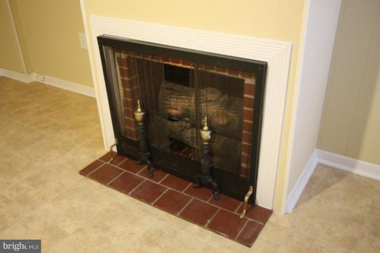 8210 Pleasant Plains Road Towson, MD 21286 - Photo 26 of 30 FIREPLACE IS IN THE FAMILY ROOM.