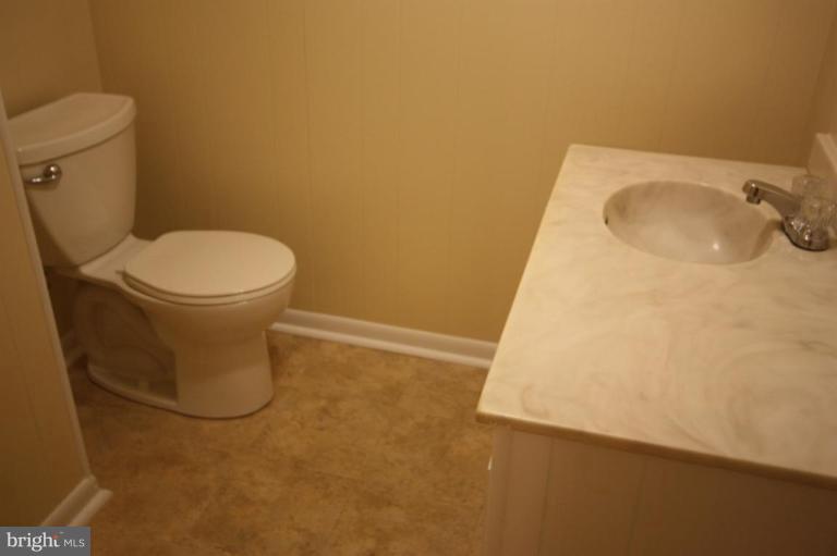 8210 Pleasant Plains Road Towson, MD 21286 - Photo 28 of 30 CONVENIENT BATHROOM ON THE LOWER LEVEL