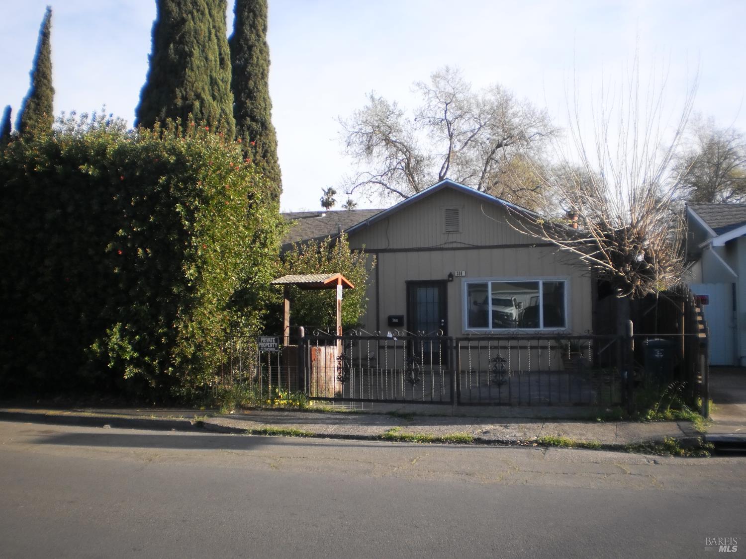 1911 Corby Avenue Santa Rosa, CA 95407 - Photo 16 of 19 a front view of a house with a yard and garage