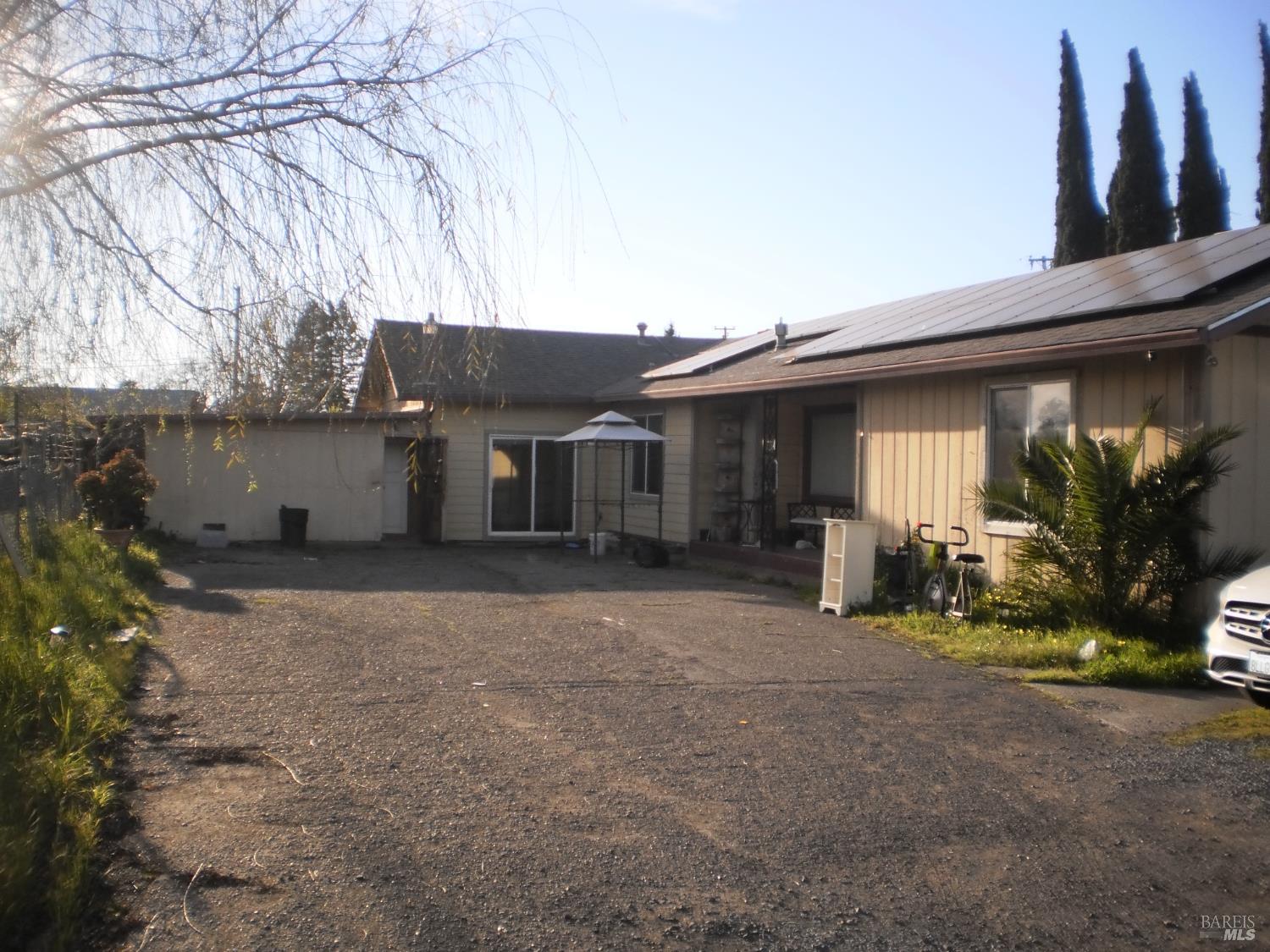 1911 Corby Avenue Santa Rosa, CA 95407 - Photo 2 of 19 a view of a house with backyard and sitting area