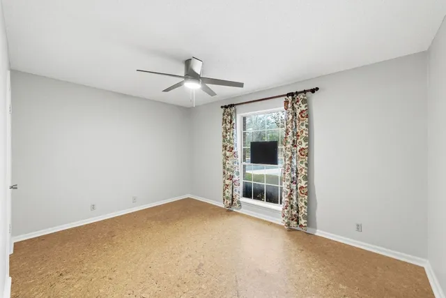 a swimming pool view with a outdoor seating