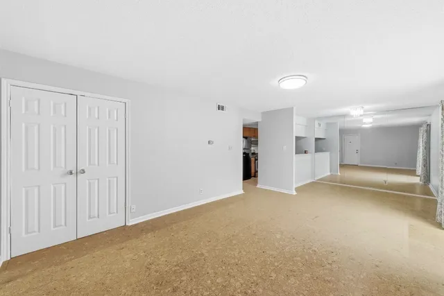 an empty room with closet