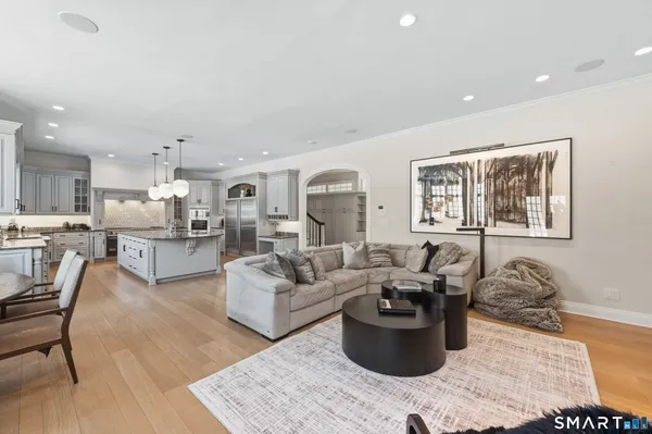 a living room with furniture and a table