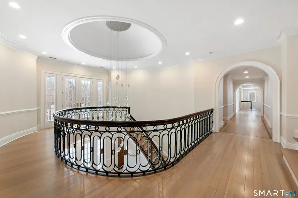 a view of entryway with wooden floor