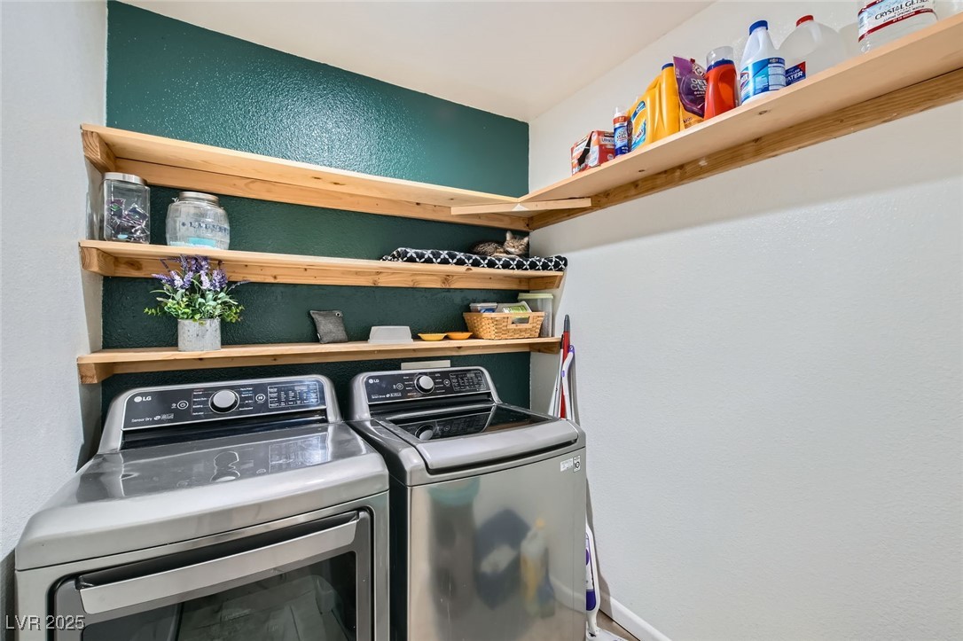 8920 Rusty Rifle Avenue Las Vegas, NV 89143 - Photo 25 of 37 Laundry room with shelves.