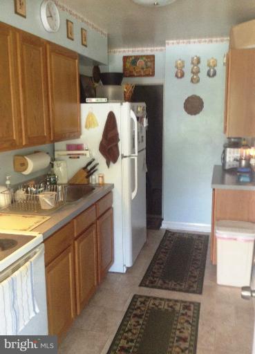 6708 Woodley Road Baltimore, MD 21222 - Photo 11 of 18 Kitchen Side