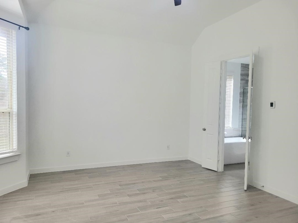 17351 Merigold Hts Drive Conroe, TX 77302 - Photo 18 of 49 a view of an empty room and window