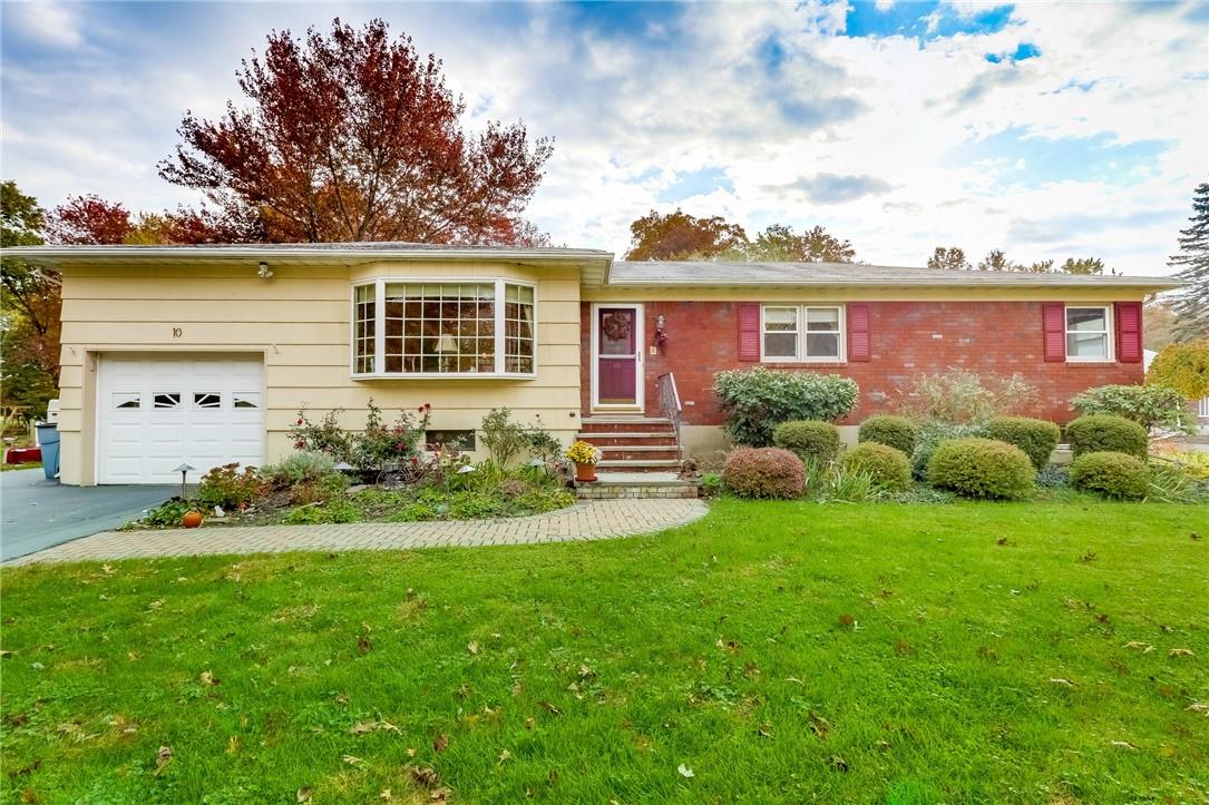 10 Lawrence Place Chestnut Ridge, NY 10977 - Photo 1 of 1 a view of a house with backyard and garden