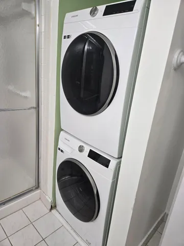 a utility room with dryer and washer