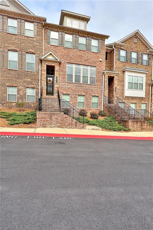 1306 Harris Way South Atlanta, GA 30319 - Photo 19 of 19 a small house with a outdoor space