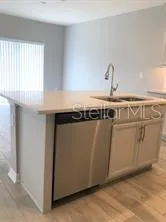 a close view of utility room with washer and dryer