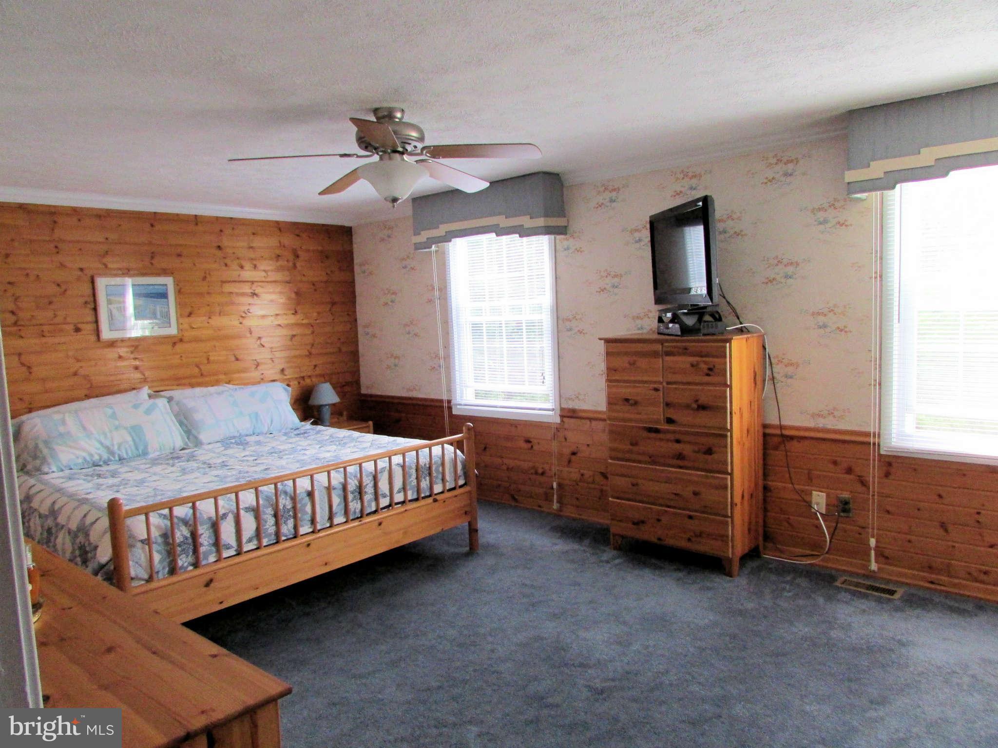 6915 Pinecrest Road Baltimore, MD 21228 - Photo 16 of 30 a bedroom with a bed and a closet