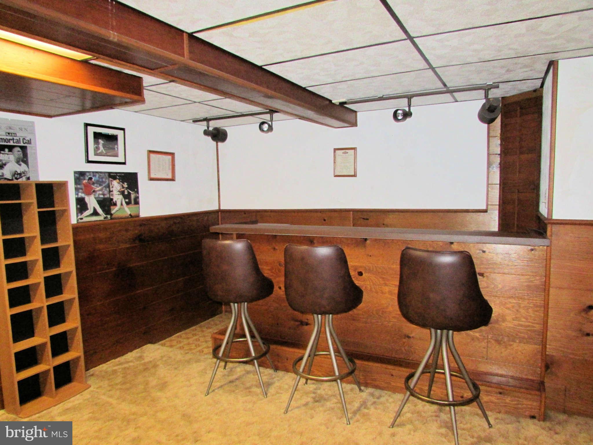 6915 Pinecrest Road Baltimore, MD 21228 - Photo 22 of 30 a table and chairs in a blue room