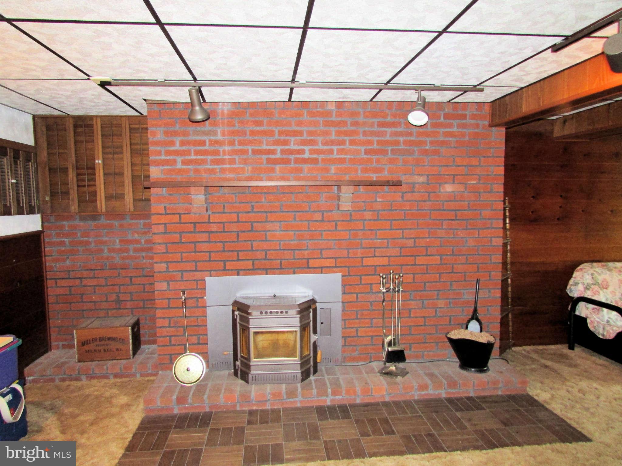 6915 Pinecrest Road Baltimore, MD 21228 - Photo 24 of 30 a view of a brick wall with seating space