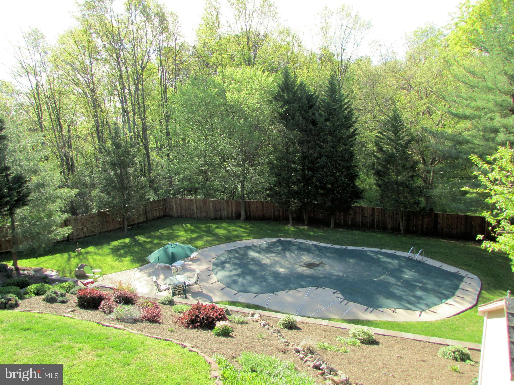 6915 Pinecrest Road Baltimore, MD 21228 - Photo 25 of 30 a view of a backyard with a barn