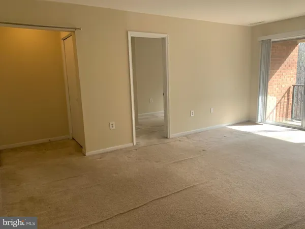 a view of a balcony with wooden floor