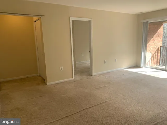 a view of a balcony with wooden floor
