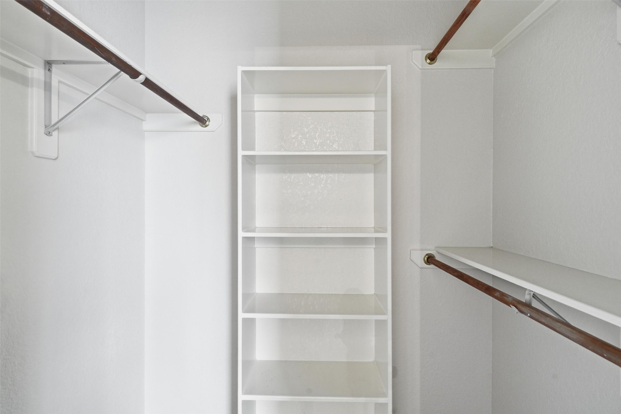 4607 Sebastopol Drive Pearland, TX 77584 - Photo 17 of 26 a view of an empty walk in closet