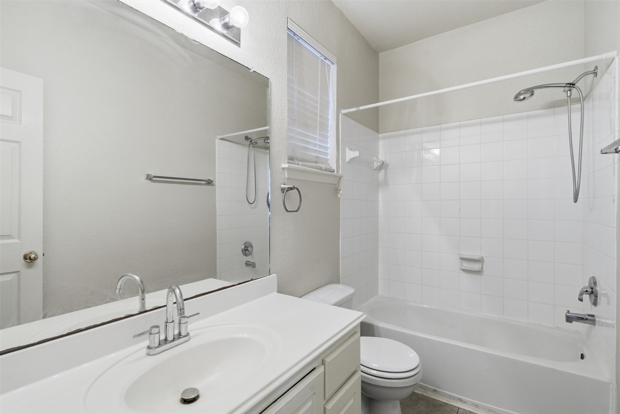 4607 Sebastopol Drive Pearland, TX 77584 - Photo 20 of 26 a bathroom with a sink a toilet and shower