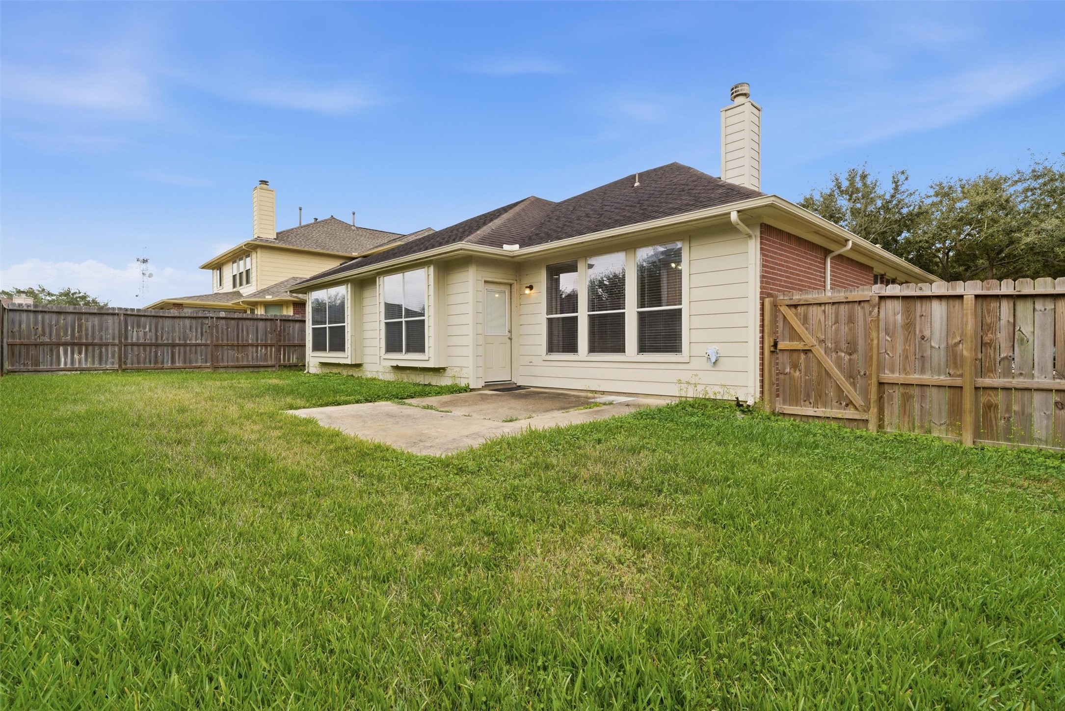 4607 Sebastopol Drive Pearland, TX 77584 - Photo 24 of 26 a front view of a house with a yard