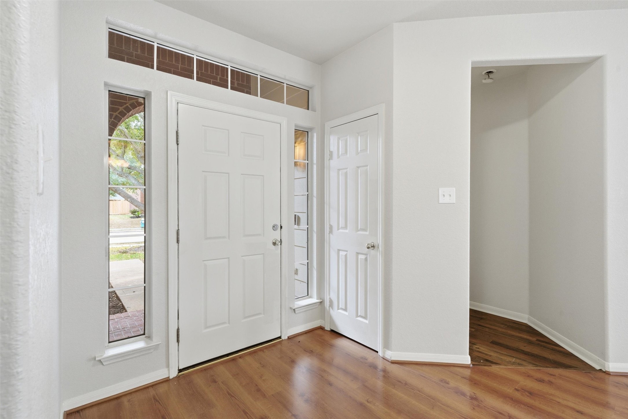 4607 Sebastopol Drive Pearland, TX 77584 - Photo 3 of 26 a view of entryway with wooden floor