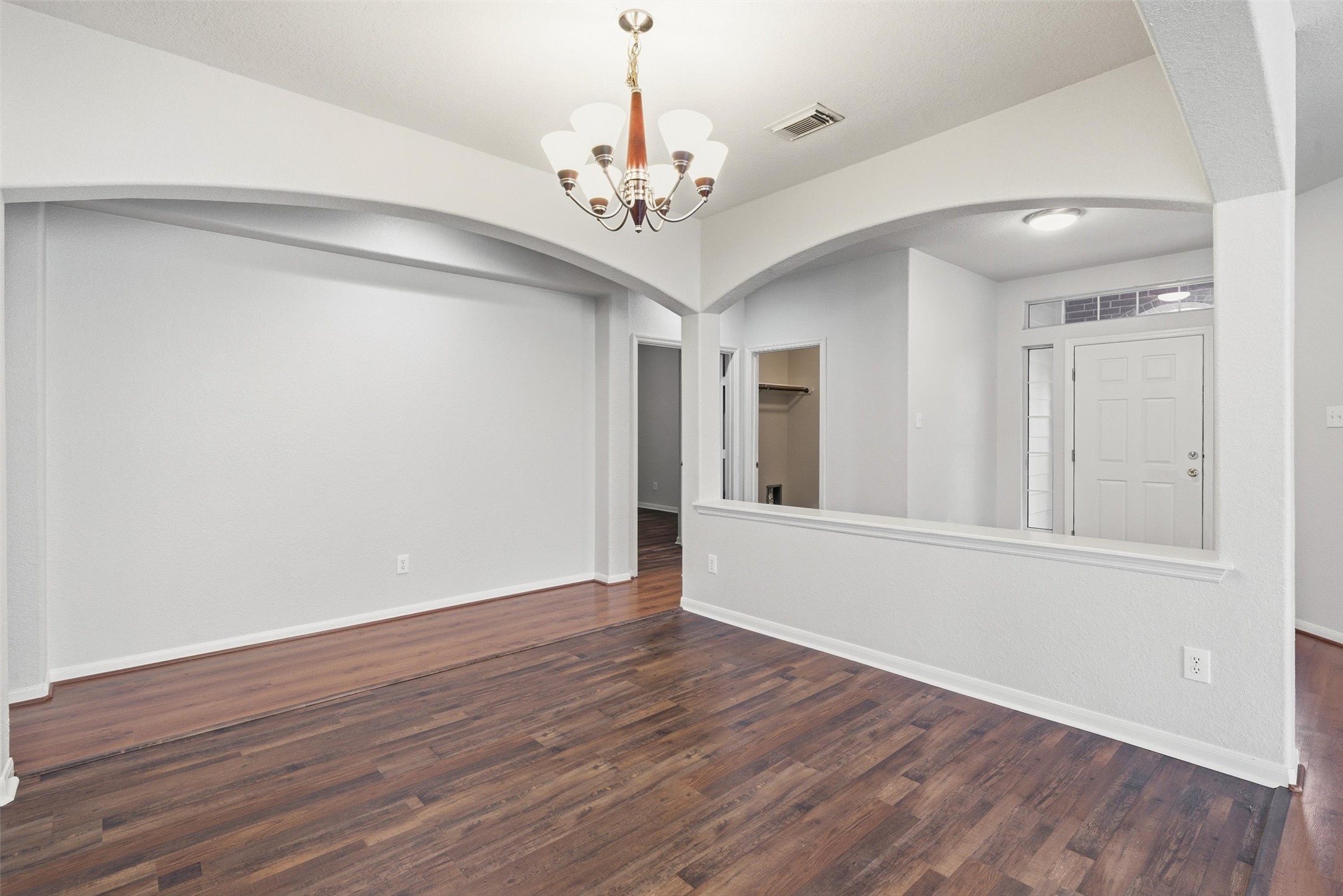 4607 Sebastopol Drive Pearland, TX 77584 - Photo 6 of 26 wooden floor in an empty room with a window