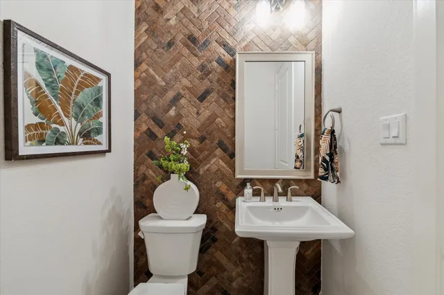 a bed room with a bed and a large window