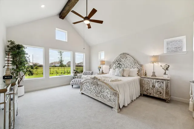 a bedroom with bed and window