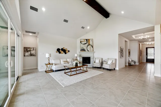 a living room with furniture and a view of living room
