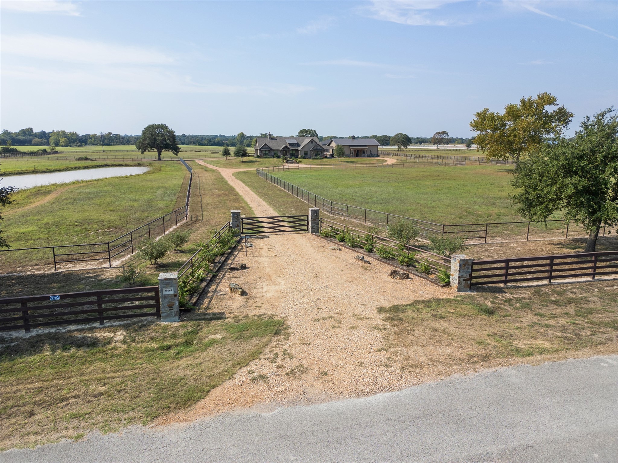 30163 High Spirit Ranch Road Hempstead, TX 77445 - Photo 45 of 46 A private gated entrance is your first view of the property.