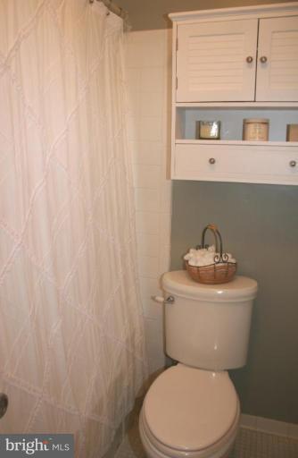 7200 Racepoint Way Alexandria, VA 22315 - Photo 18 of 29 New cabinet and tile floor in Master Bath
