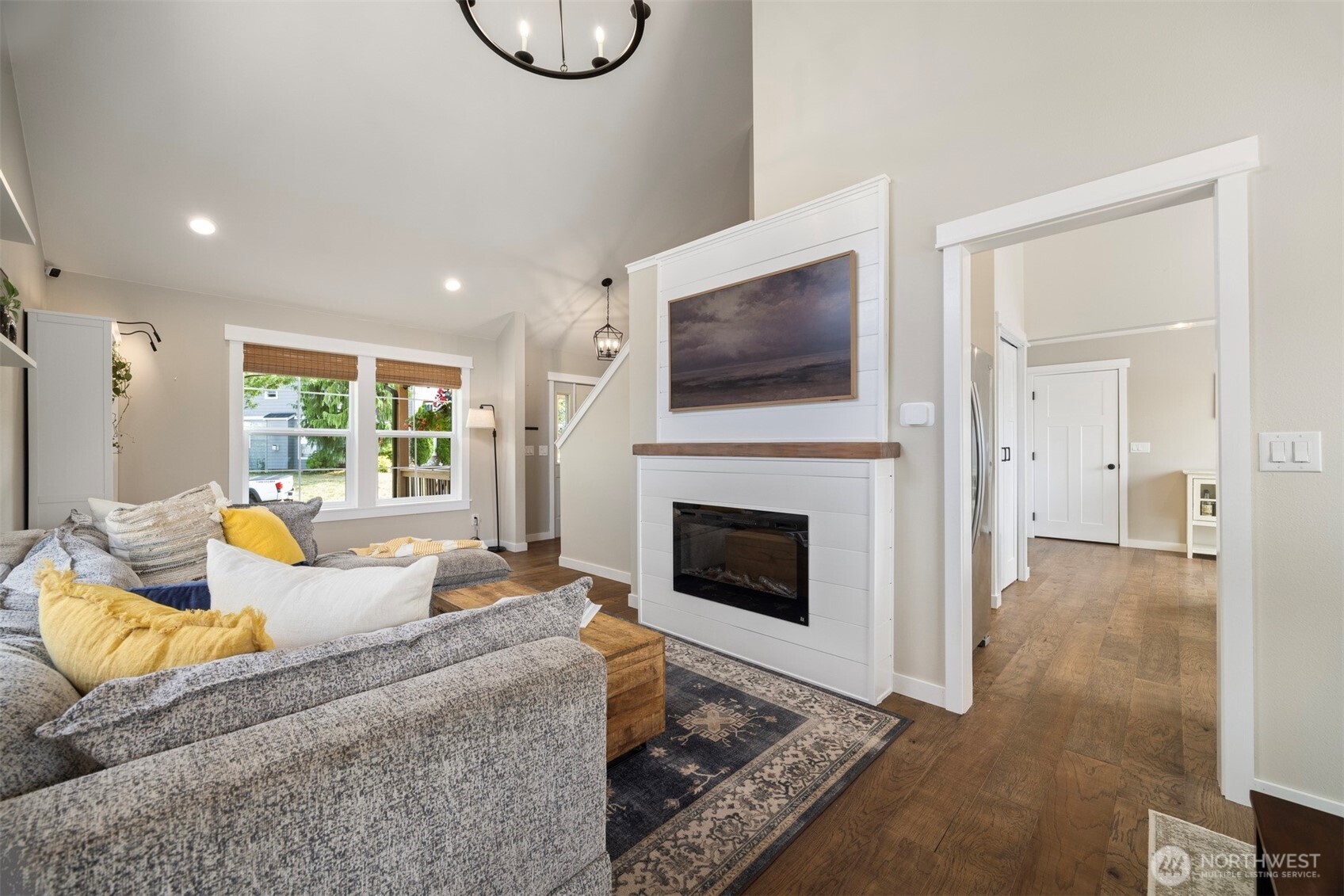 3941 Lakemont Road Bellingham, WA 98226 - Photo 15 of 40 a living room with furniture a flat screen tv and a fireplace