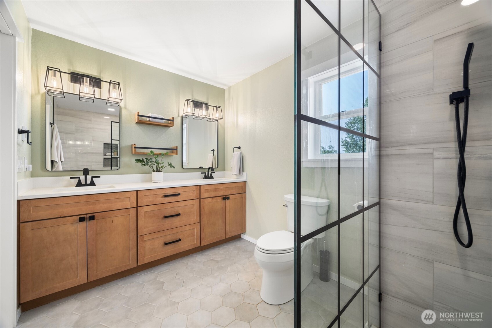 3941 Lakemont Road Bellingham, WA 98226 - Photo 20 of 40 a bathroom with a double vanity sink mirror and toilet