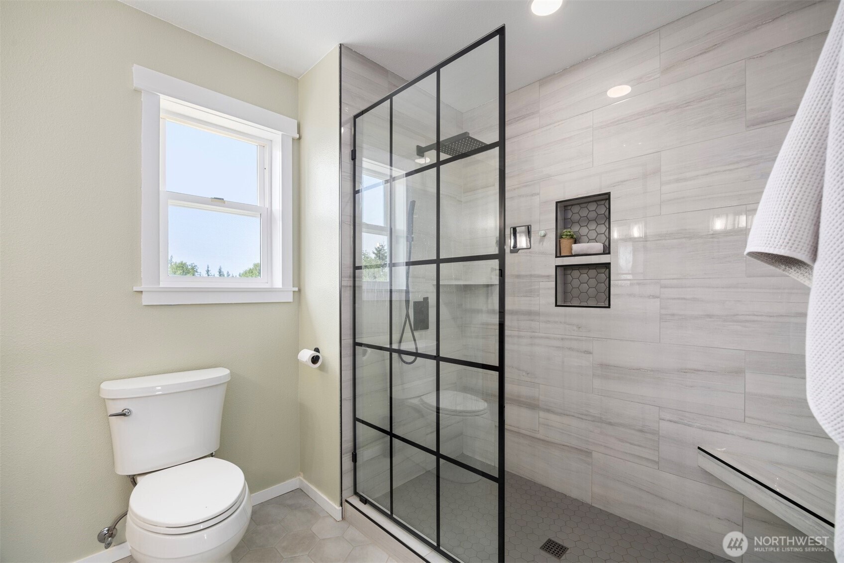 3941 Lakemont Road Bellingham, WA 98226 - Photo 21 of 40 a bathroom with a toilet a sink and shower