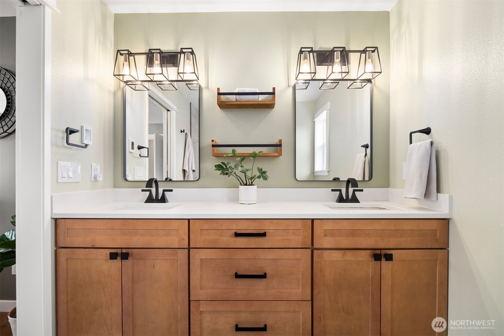 3941 Lakemont Road Bellingham, WA 98226 - Photo 22 of 40 a bathroom with double vanity sinks and a mirror