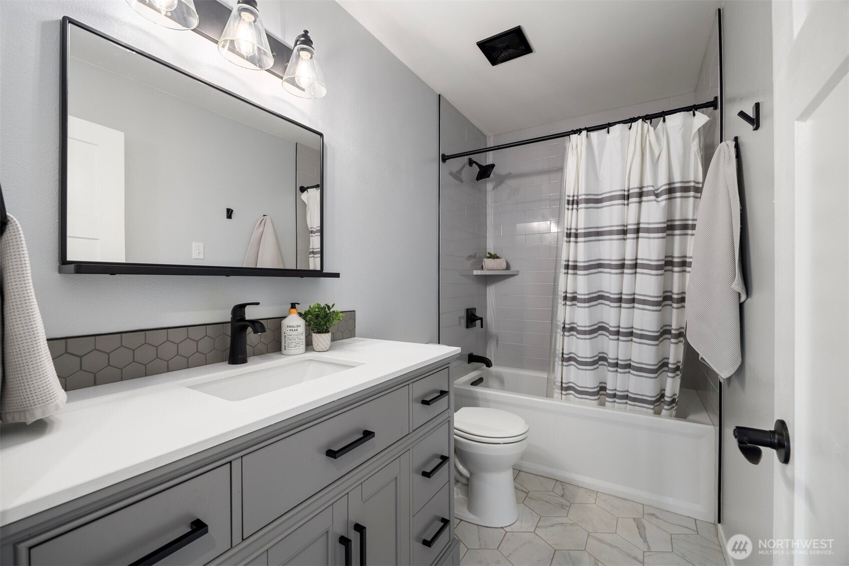 3941 Lakemont Road Bellingham, WA 98226 - Photo 26 of 40 a bathroom with a sink a toilet and shower