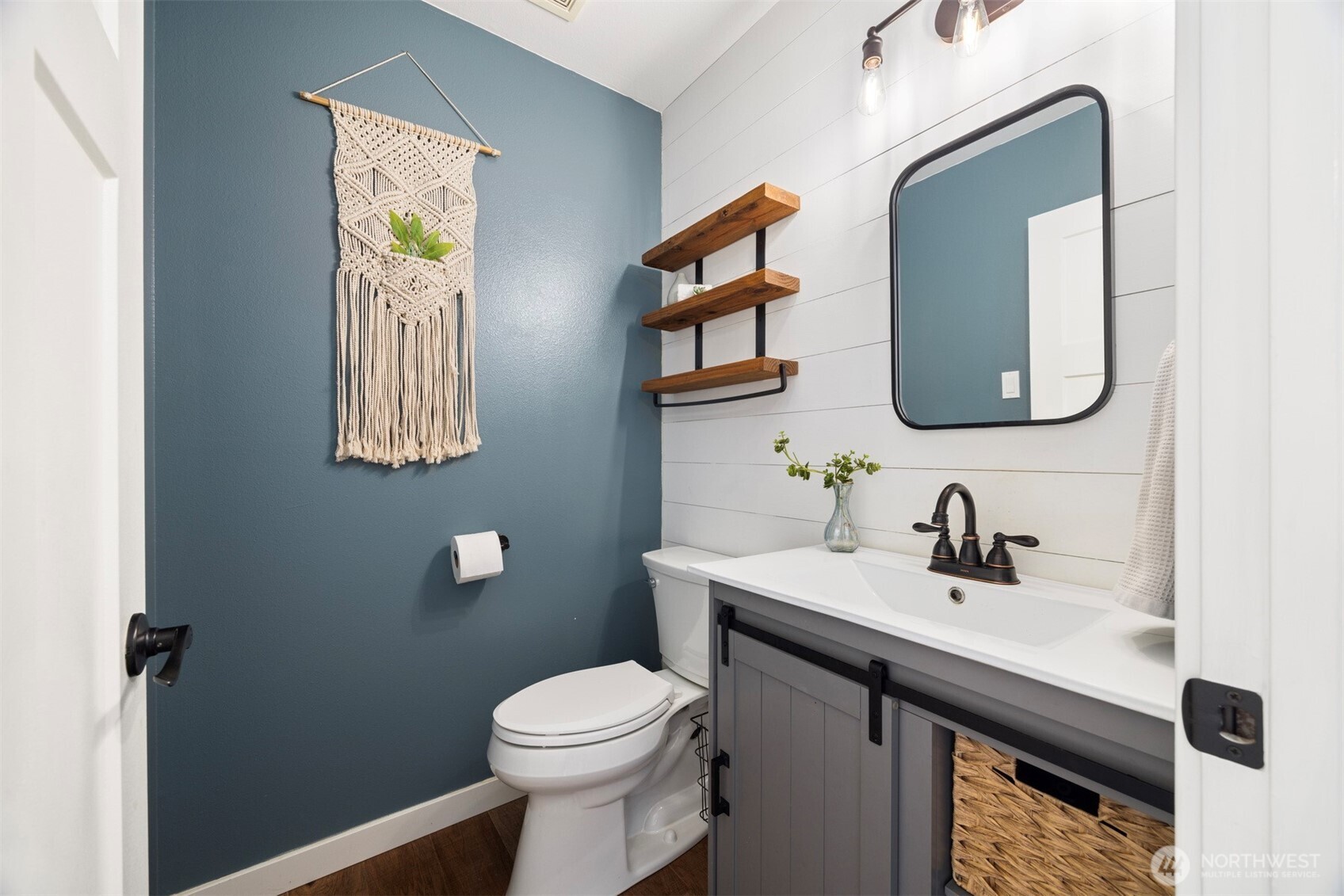 3941 Lakemont Road Bellingham, WA 98226 - Photo 30 of 40 a bathroom with a toilet sink and mirror