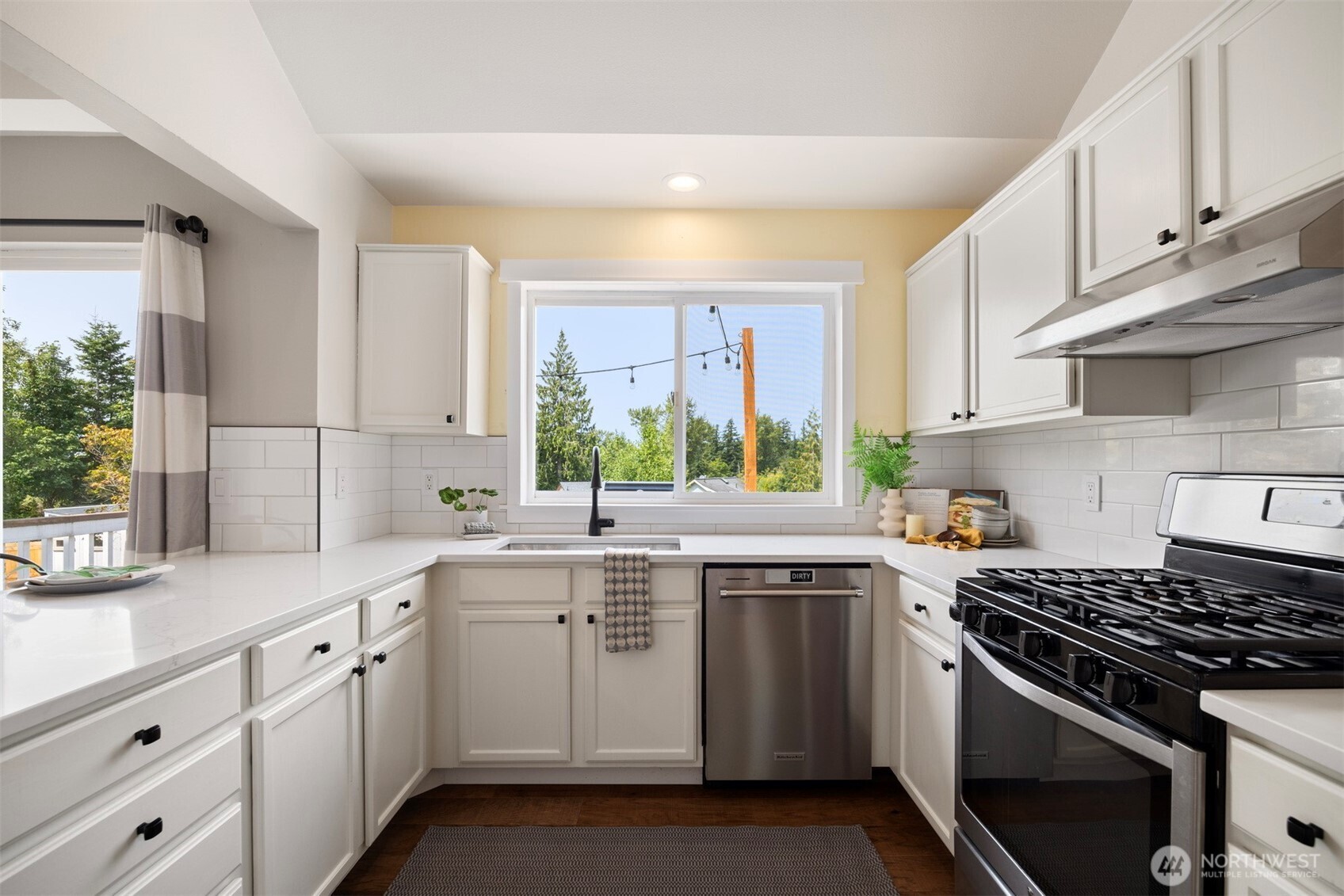 3941 Lakemont Road Bellingham, WA 98226 - Photo 6 of 40 a kitchen that has a sink and a stove