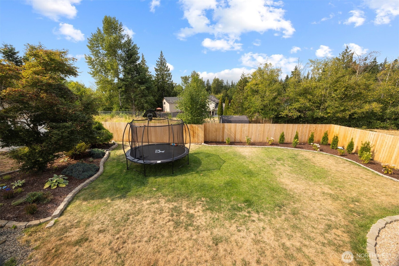 3941 Lakemont Road Bellingham, WA 98226 - Photo 10 of 40 a view of a backyard with swimming pool
