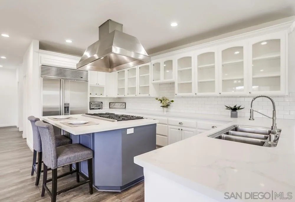 39431 American Road Fallbrook, CA 92028 - Photo 14 of 62 a kitchen with a sink a stove a refrigerator and cabinets