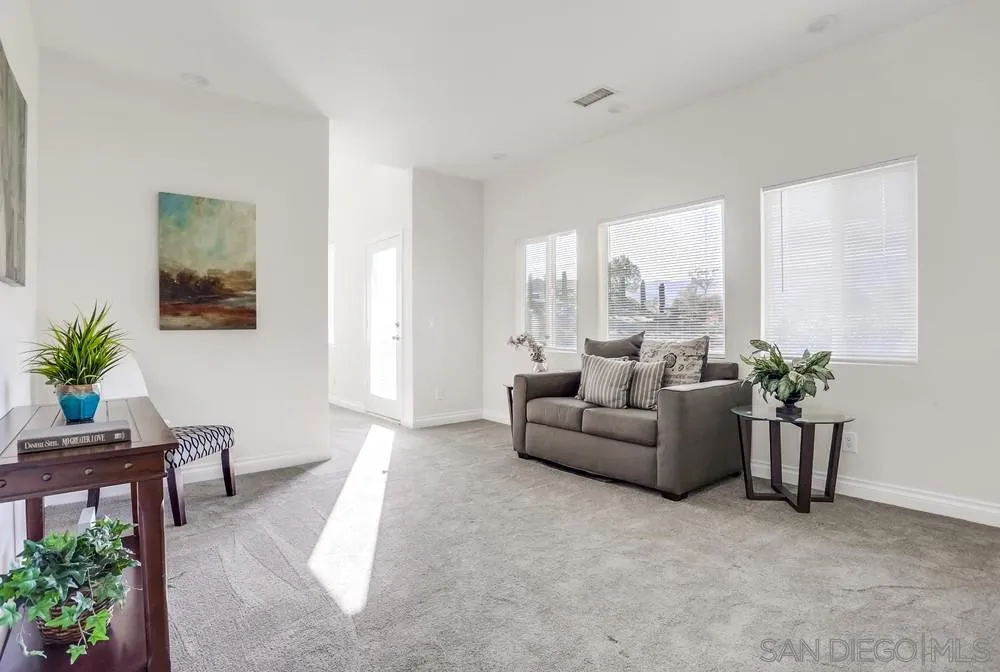 39431 American Road Fallbrook, CA 92028 - Photo 22 of 62 a living room with furniture and a large window