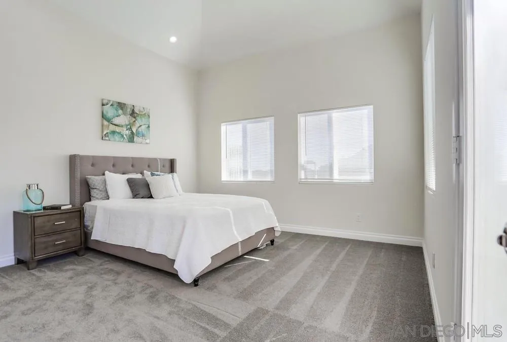 39431 American Road Fallbrook, CA 92028 - Photo 25 of 62 a spacious bedroom with a bed and a window
