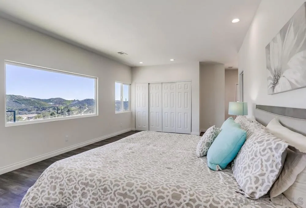 39431 American Road Fallbrook, CA 92028 - Photo 28 of 62 a bedroom with a bed and a window