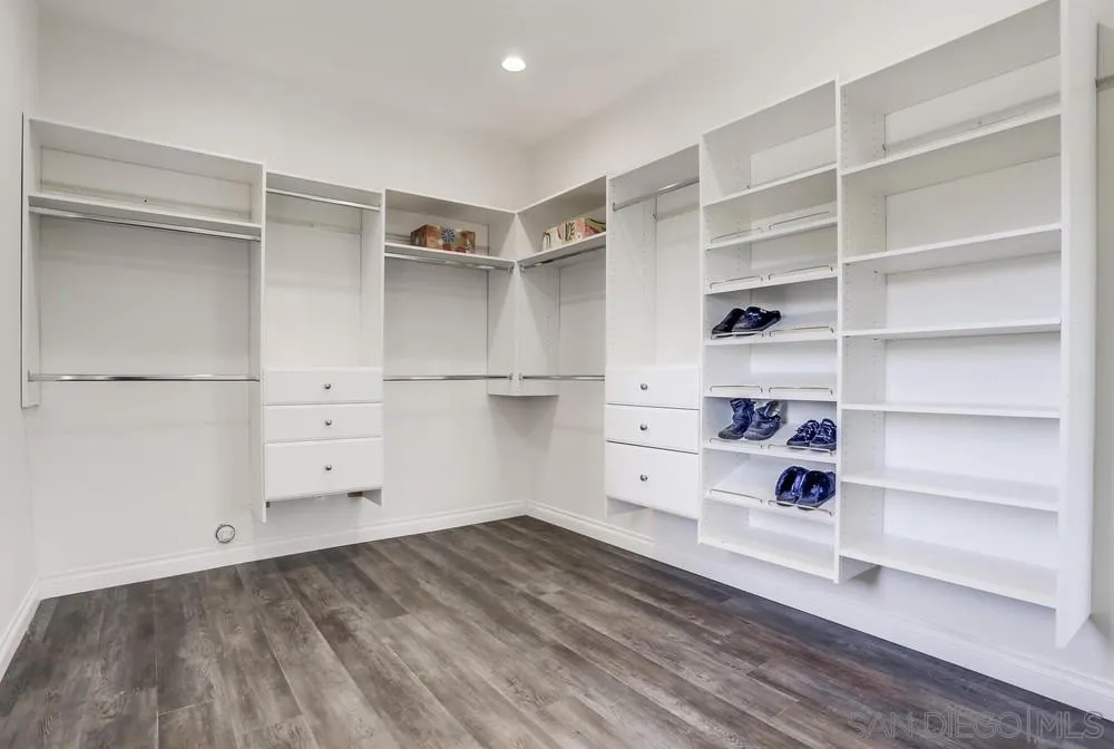 39431 American Road Fallbrook, CA 92028 - Photo 33 of 62 a view of walk in closet with empty racks