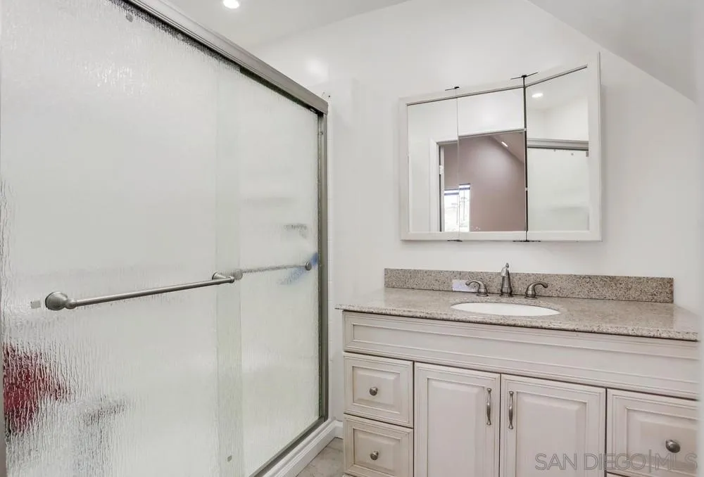 39431 American Road Fallbrook, CA 92028 - Photo 52 of 62 a bathroom with a sink and a mirror