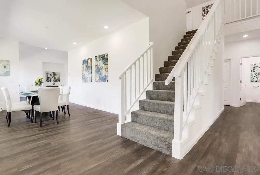 39431 American Road Fallbrook, CA 92028 - Photo 6 of 62 a view of dining room and hall with wooden floor