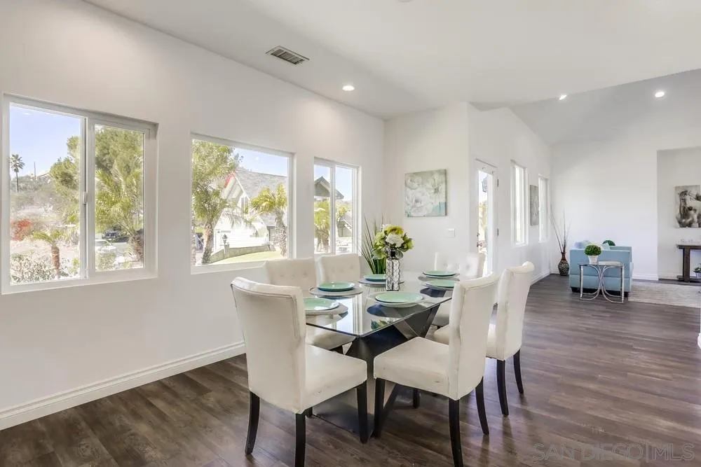 39431 American Road Fallbrook, CA 92028 - Photo 7 of 62 a view of a dining room with furniture and wooden floor