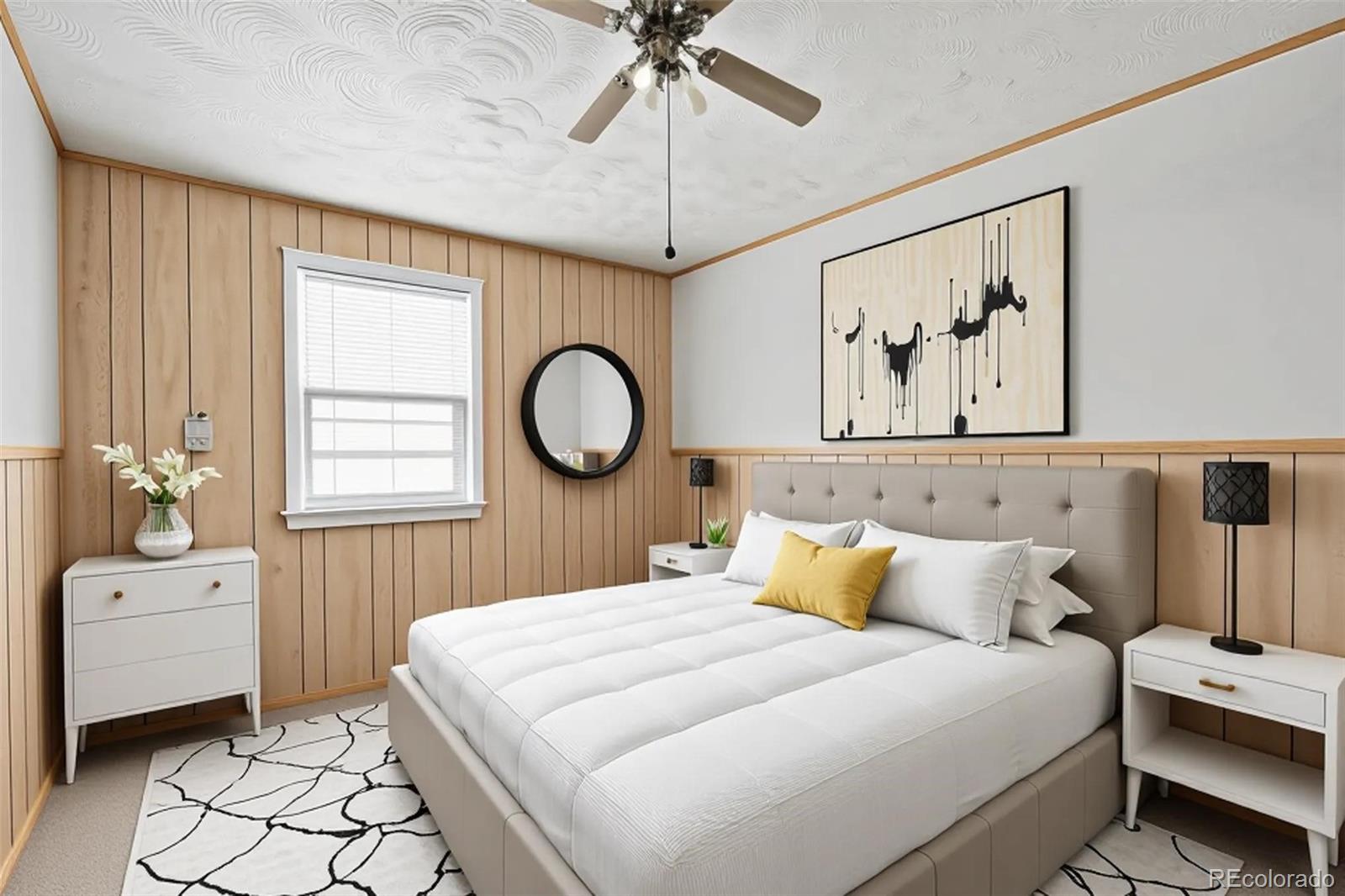 901 County Road 3 Wiggins, CO 80654 - Photo 14 of 28 a bedroom with a bed and a chandelier