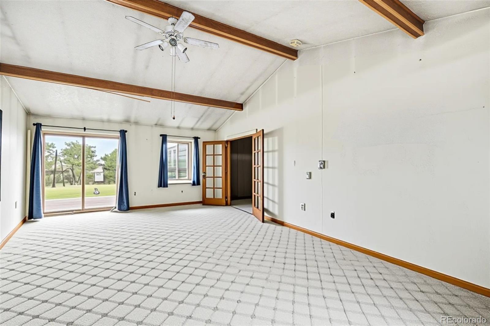901 County Road 3 Wiggins, CO 80654 - Photo 8 of 28 a view of an empty room with a window
