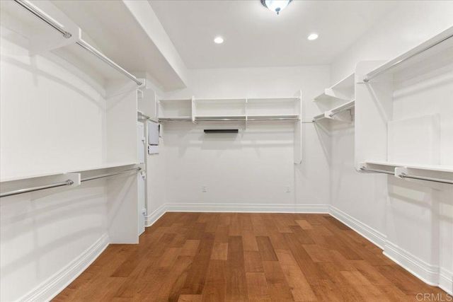 a view of a livingroom with wooden floor